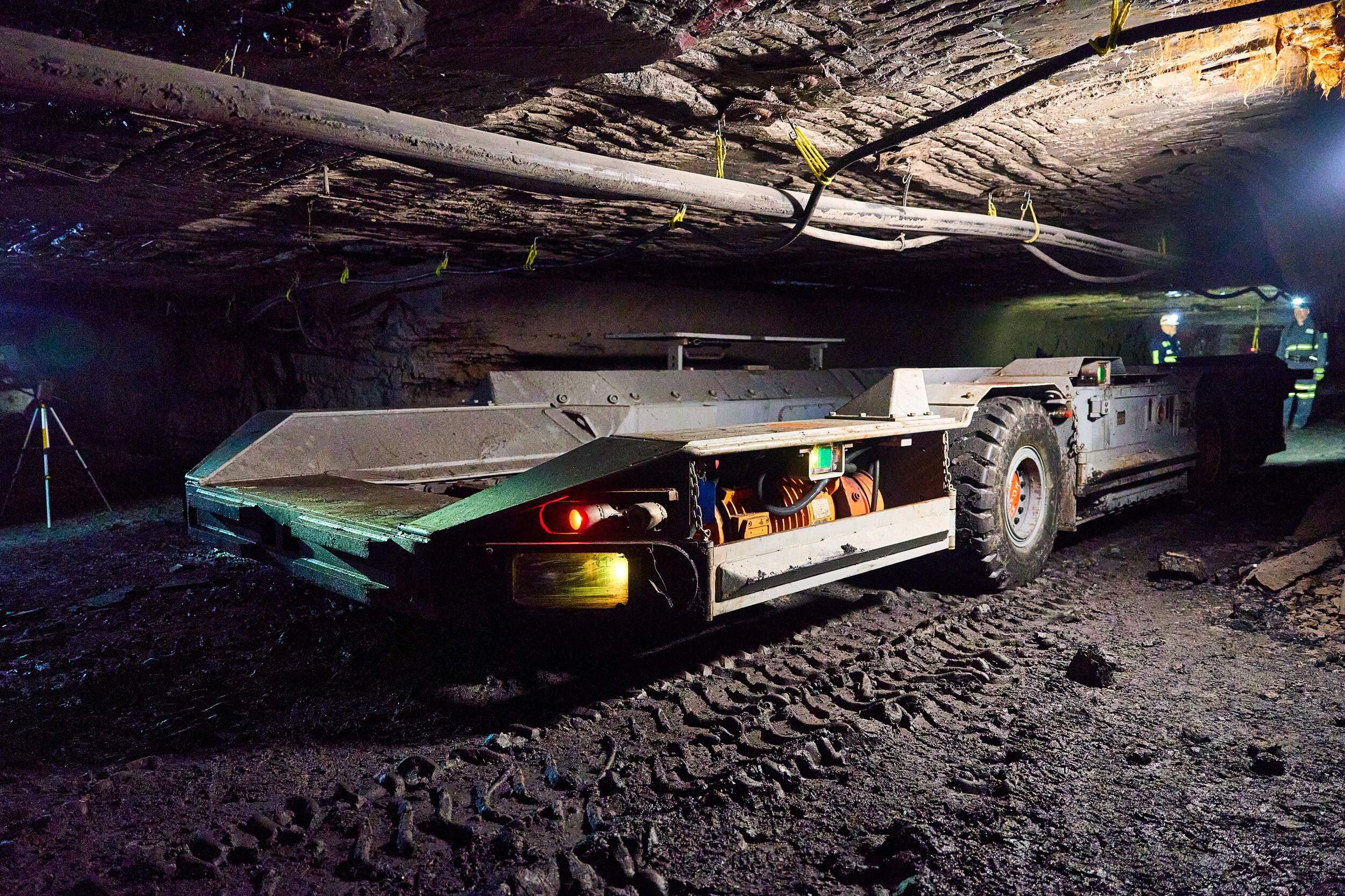 Mining shuttle car with sensors showing warning zone